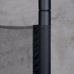 Detachable mesh safety net attached to the Arcada stand upright