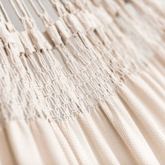 Close-up of the Bossanova Latte macramé fringe
