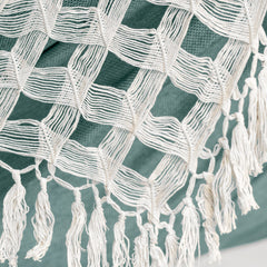 Close-up of the Bossanova macramé fringe and tassels