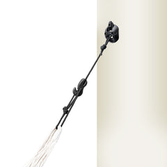 Black CasaMount mount fixed to a wall, holding a hammock suspension cord