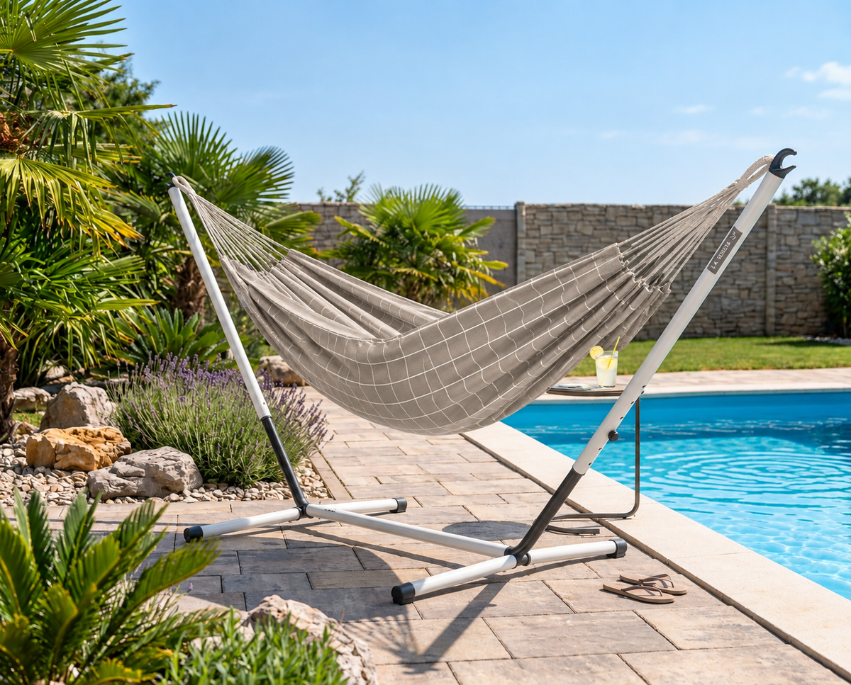 LA SIESTA Brisa Almond kingsize hammock on a steel stand beside a pool (stand sold separately)