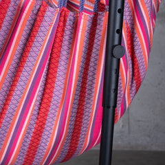 Flamingo pink striped fabric beside the adjustable Fiji stand upright