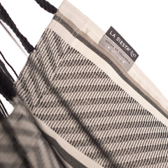 LA SIESTA label on the Zebra black and cream striped fabric