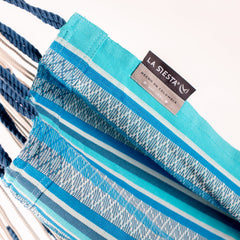 LA SIESTA label on the Azure blue organic cotton fabric