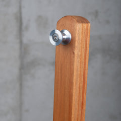 Metal hanging knob at the top of the Udine eucalyptus stand post