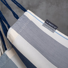 LA SIESTA label on the Sea Salt blue and cream striped fabric