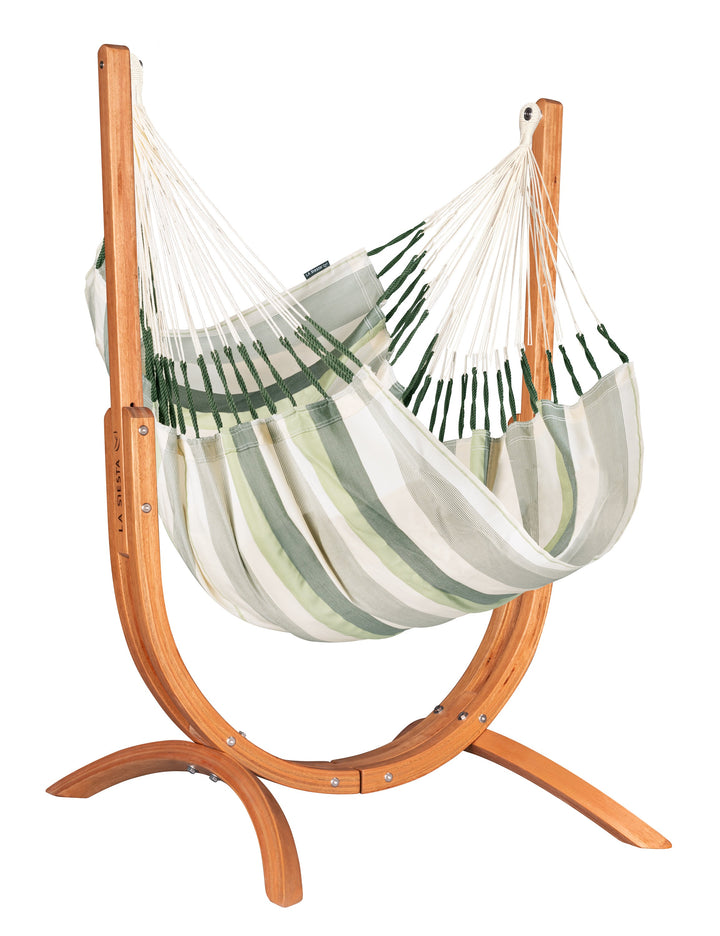 Striped hammock on a wooden stand against a white background