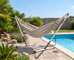 LA SIESTA Brisa Almond kingsize hammock on a steel stand beside a pool (stand sold separately)