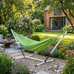 LA SIESTA Brisa Lime kingsize hammock on a white and grey Nautico stand in a garden