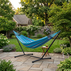 LA SIESTA Brisa Wave kingsize hammock on a black Nautico stand on a garden patio