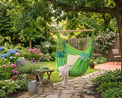 LA SIESTA Domingo Lime king size hammock chair hanging from a tree above a garden path